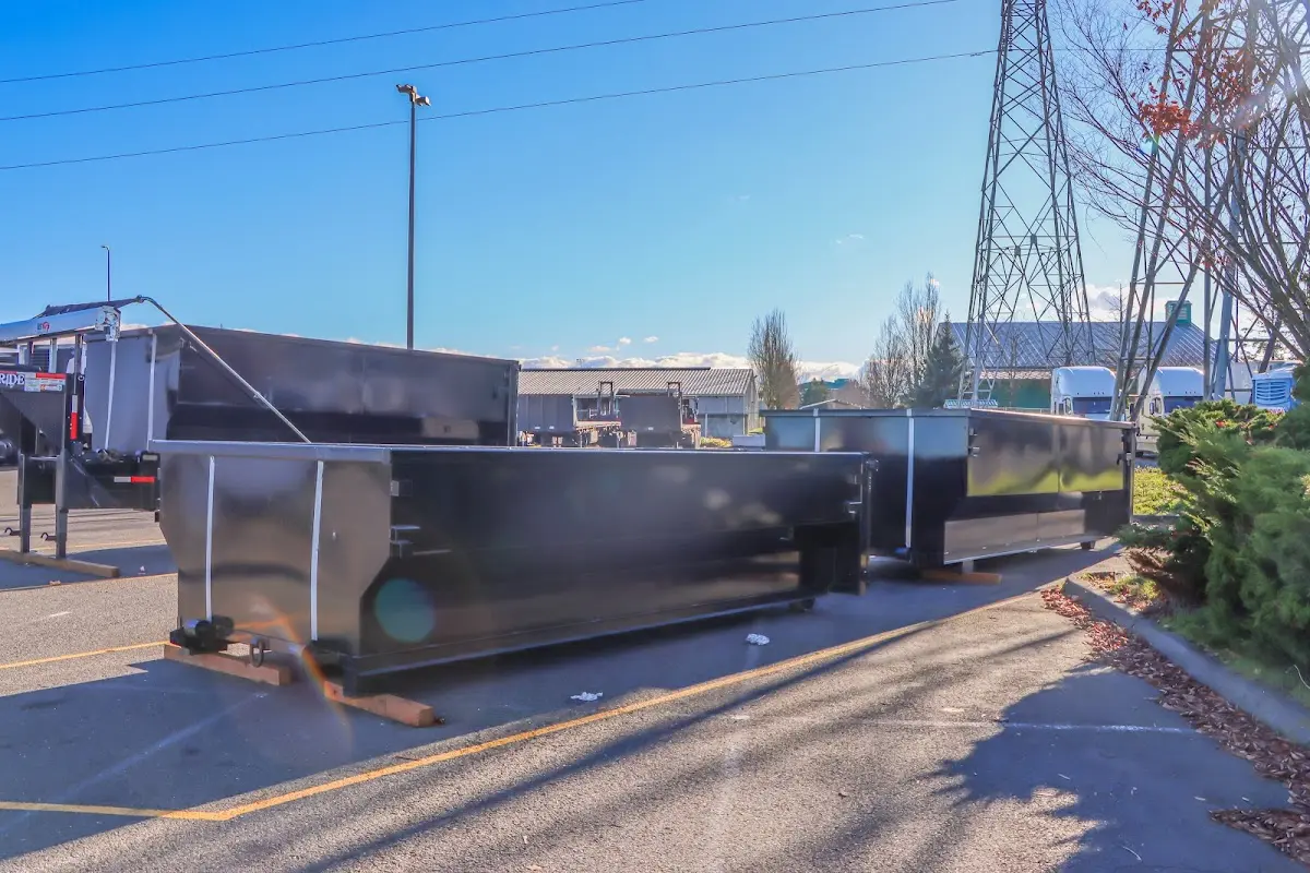 Roll-off dumpster ready for waste disposal at job site for Construction Dumpster Rental in Woodside
